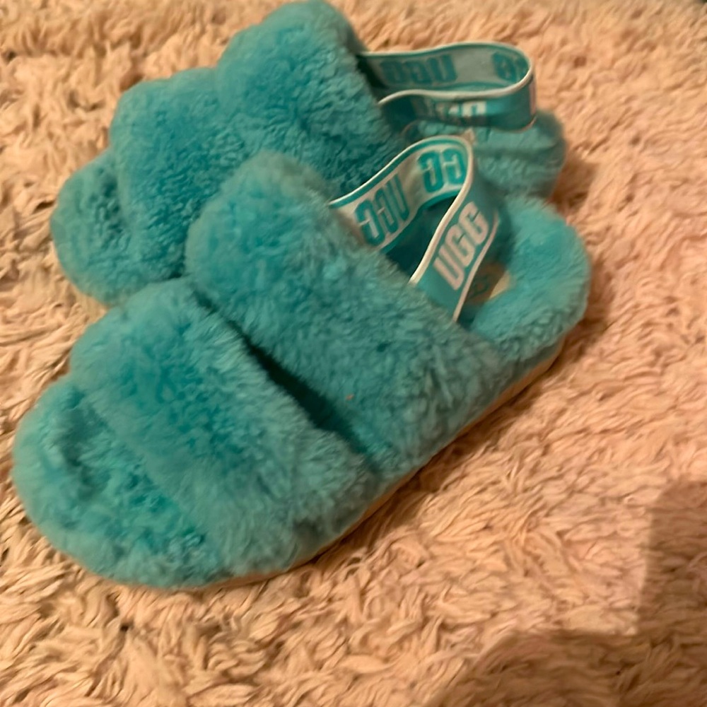 Ugg slippers, teal, size 7. I have only worn these one time.